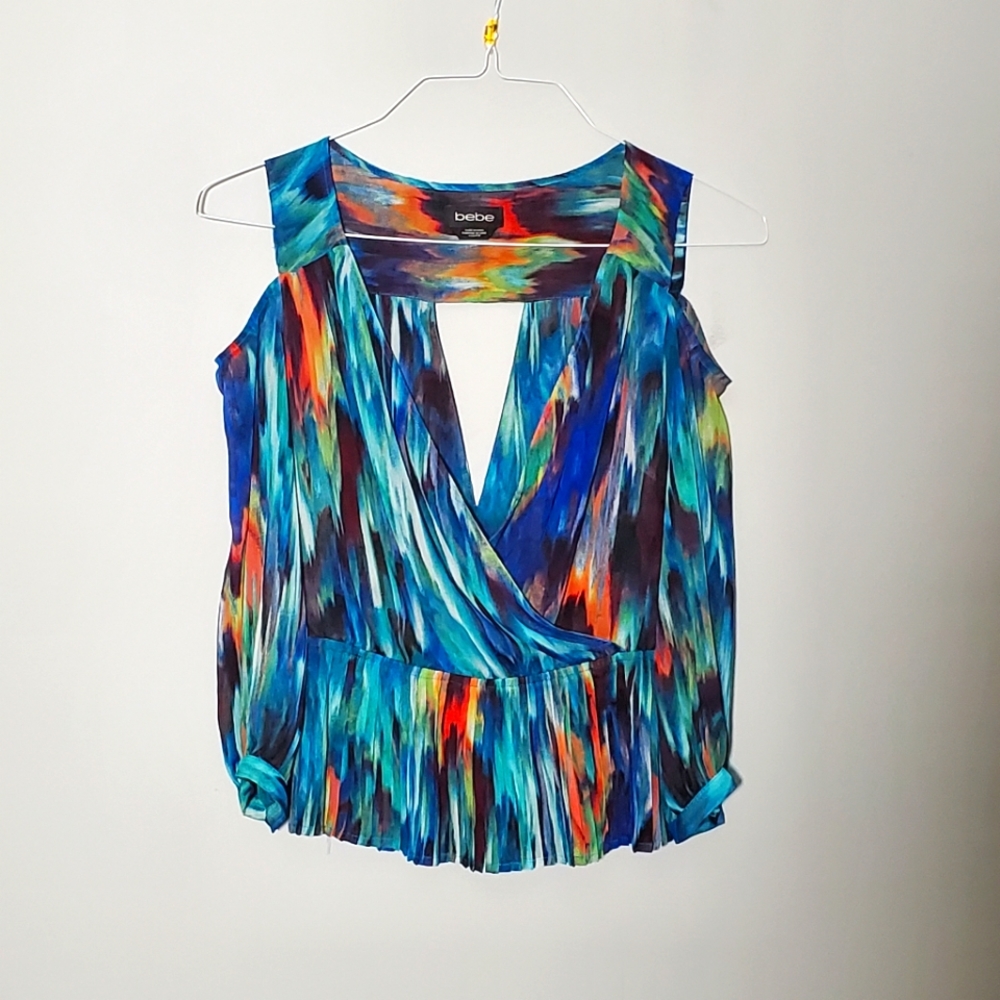 Bebe colorful cold shoulder peplum top xxs